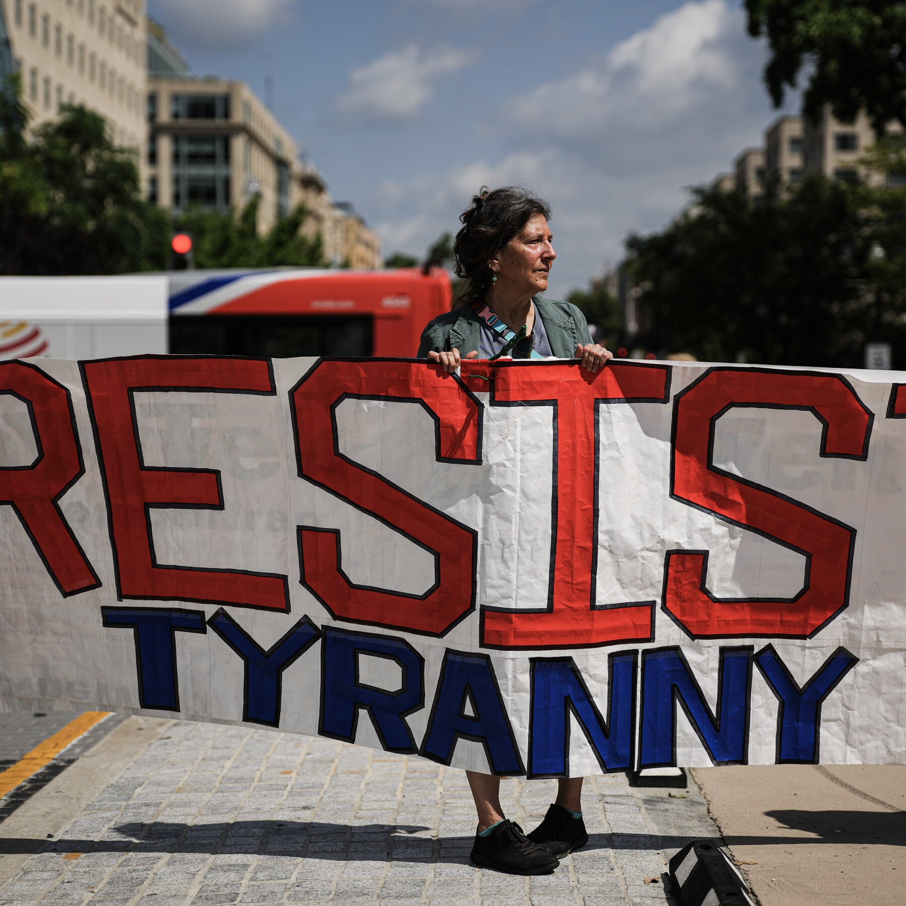 Protesters Gather Near White House as Trump Unveils D.C. Plans
