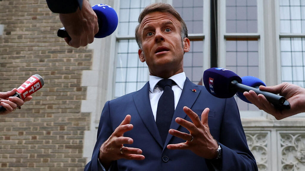 President Macron vows to serve out his term despite budget crisis