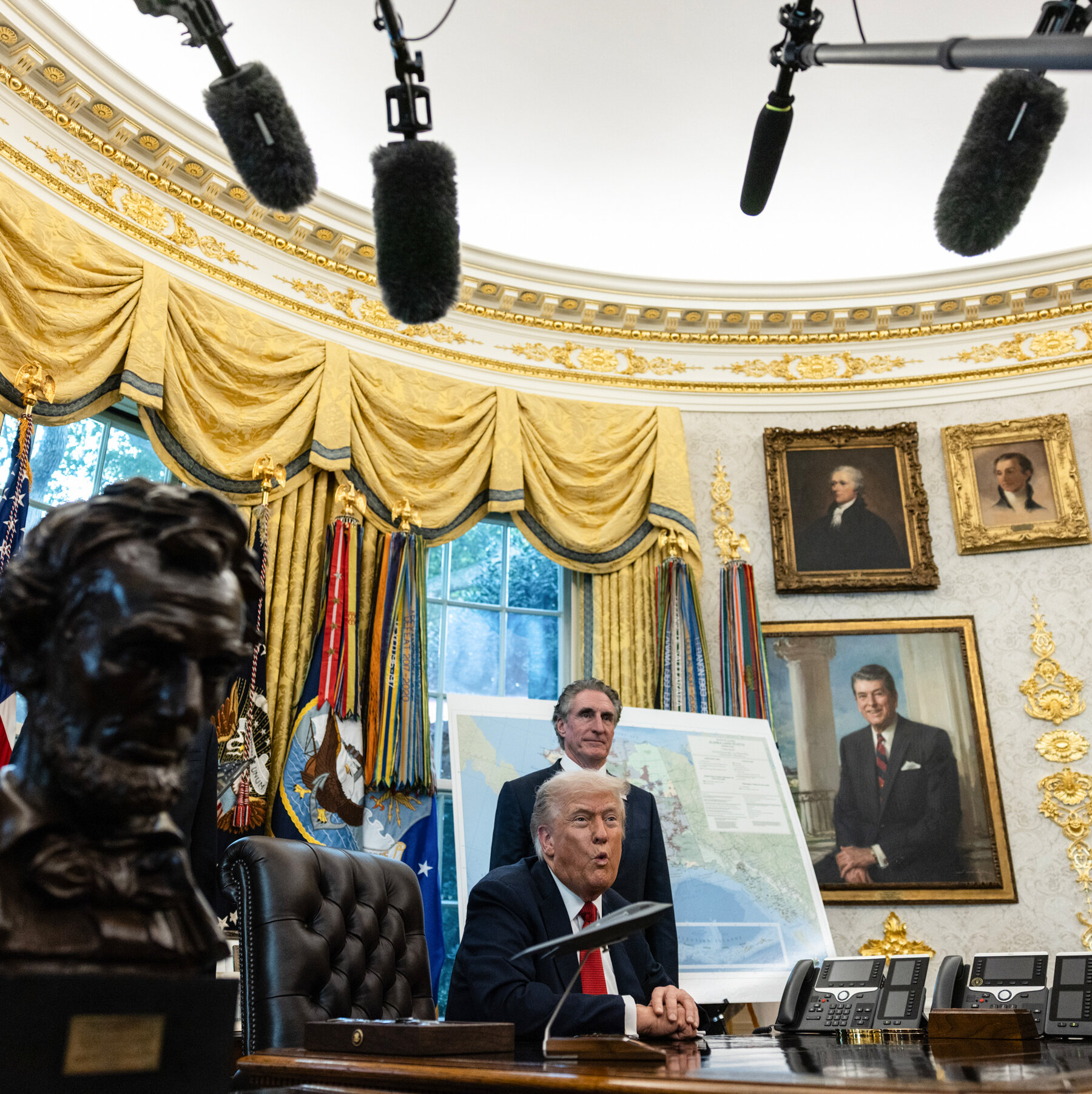 After pushback from courts on troops, Trump threatens to invoke the Insurrection Act.