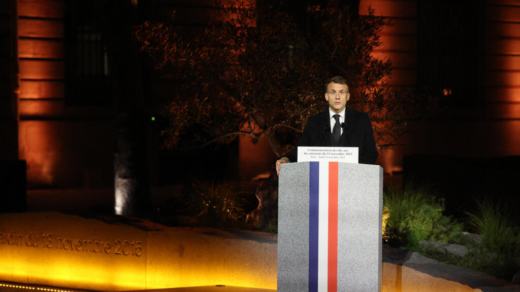 Macron warns of shifting threat as France honours Paris attack victims