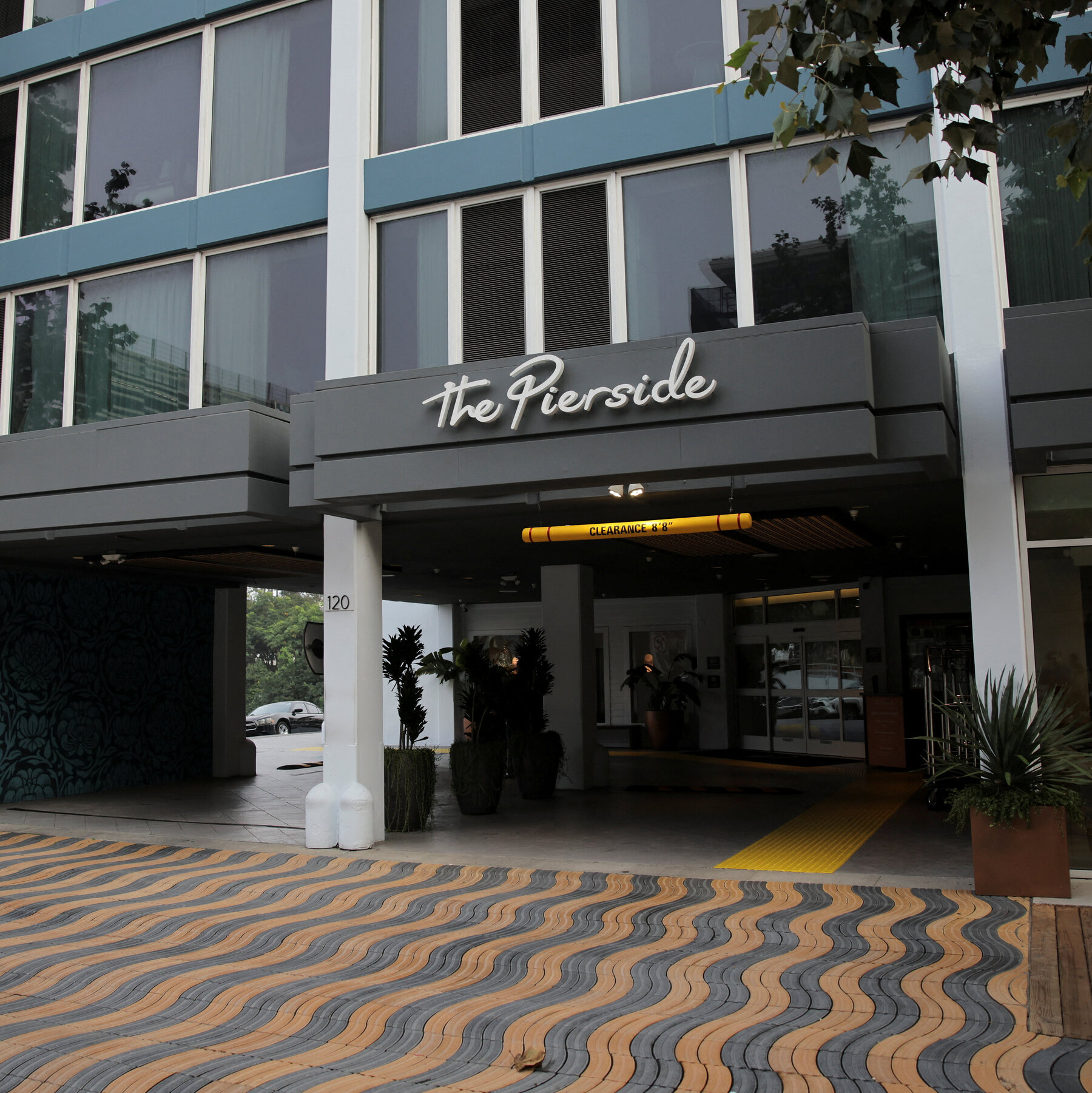 Investigators look at a Santa Monica hotel as they trace Nick Reiner’s movements.