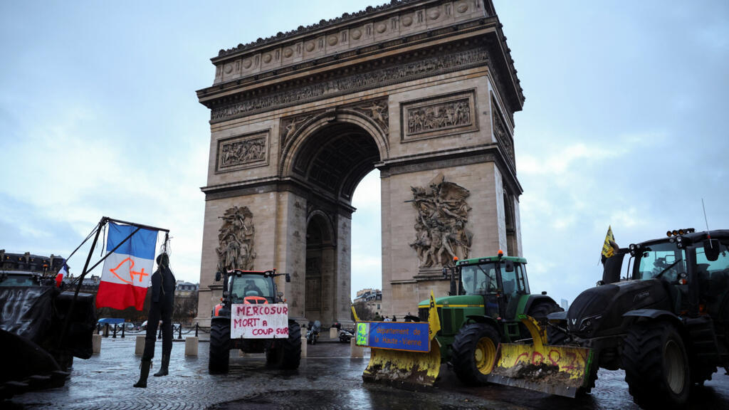 Angry French farmers defy ban and block Paris streets over Mercosur deal