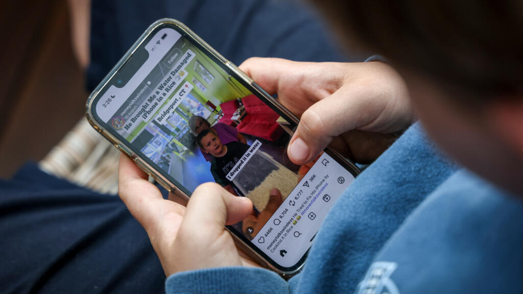 French MPs vote to curb children’s screen time with under-15 social media ban