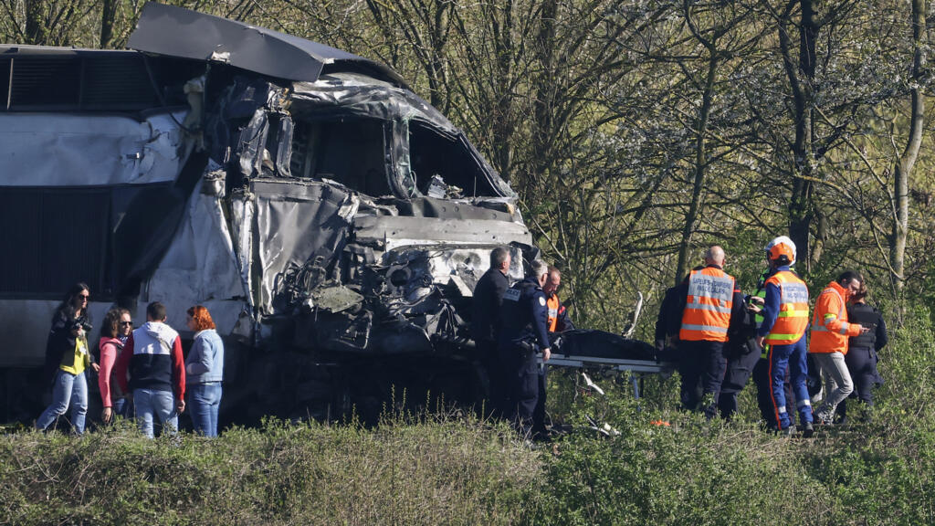 Train driver killed and truck driver in custody after collision in northern France