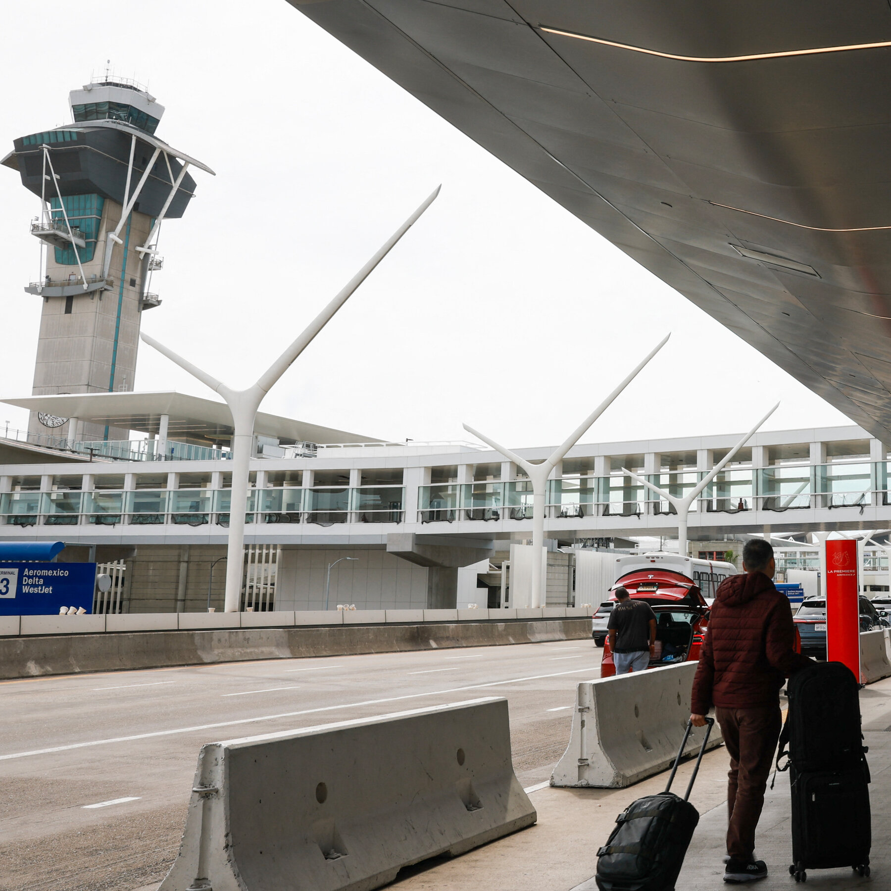 California Woman Is Arrested at LAX and Accused of Selling Weapons for Iran